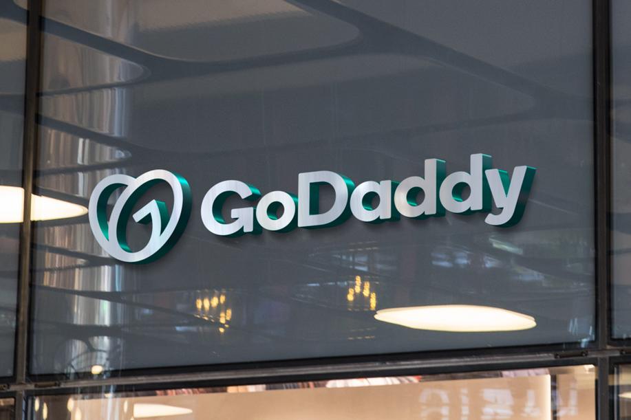 GoDaddy logo on Wall